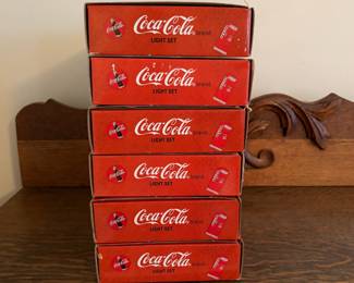 A224 - 6 Available. $20 each. Coca-Cola light sets.