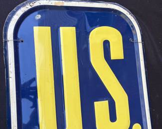 A54 - $650. 1950 US Royal Farm Tires metal sign. Bottom Right is stamped AAW 9-50. Measures 16“ x 60.5“.