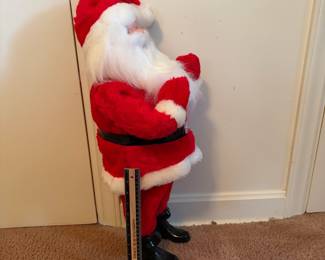 A209 - $100. 1960s Harold Gale Santa 7-Up. Measures 26 inches tall. In good vintage shape.