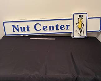A192 - $125. 1980s Mr. Peanut Nut Center - Double sided hard plastic sign. Measures 49" x 13".