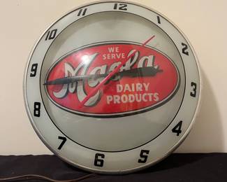 A151 - $400. 1950s Maola Dairy Products North Carolina bubble clock. Needs a new bulb. Clock works. Measures 16" diameter.
