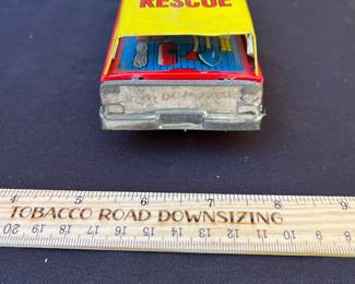 A102 - $50. Tin #8 Rescue Automobile.