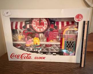 A215 - $40. Coca-Cola clock. still in box. Box measures 23 inches by 15 1/2 inches. In perfect shape. I’m