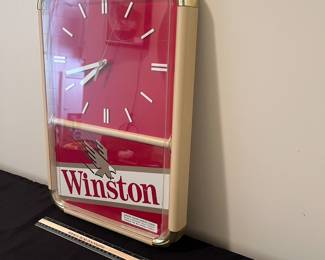 A132 - $35. 1990s Winston Wall clock. Works perfectly. Measures 14" x 20" tall.