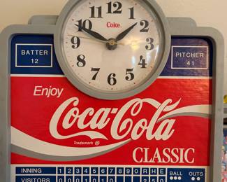 A222 - $30. Enjoy Coca-Cola Clock baseball stadium. Shows some staining on the paint. Slight crack on the clock face.