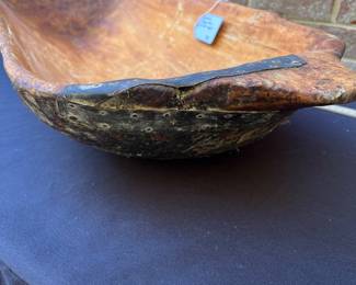 A113 - $95. Primitive Dough Bowl w/ old repair. Measures 33 1/2” x 13”.