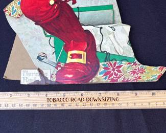 A27 - $50. Norman Rockwell Pepsi Counter Display Stand. Foot & bottle creased. Measures 20 inches tall.
