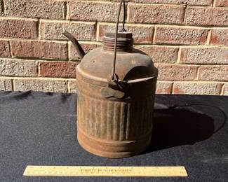 A82 - $40. Antique Railroad oil/kerosene can. Measures 10” tall. It has some dents throughout.