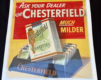 A12 - $125. Chesterfield Cigarettes Display Sign - Cardboard. Measures 21” x 22”. The sign has some rips and creases on the corners. It also has some rubbed off color near lettering. We did not take it out of sealed package to inspect the back.