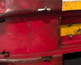 A171 - $150. 1931 Metalcraft Bottle Truck. Metal Wheels with 10 small glass bottles.