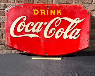 A33 - $1,250. 1945 Porcelain Enamel Door Coca Cola Kick Sign. Measures 36“ x 22.5“.