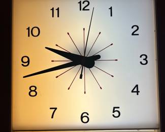A174 - $150. Atomic Starburst Wall Clock. Measures 12.75" x 20" tall. Works.
