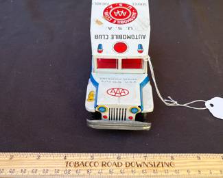A101 - $60. AAA Automobile Club Tin Car. It has some small scratches.