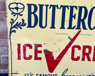 A62 - $450. Double sided Buttercup Ice cream, porcelain enamel sign. Measures 36” x 24”.