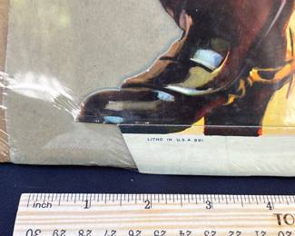 A6 - $80. Cavalier Cigarettes, die-cut counter display sign. Made in 1952. Measures 28 inches tall. Slight bending and creases on the hat and boot otherwise in great, vintage shape.
