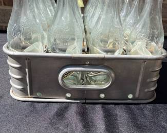 A43 - $165. 1940s Coca-Cola Aluminum Coke Bottle Stadium Carrier. Includes bottles (75th Anniversary bottles)