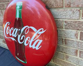A25 - $550. 1950s Coca-Cola Enameled Bubble Sign. Measures 24” diameter.
