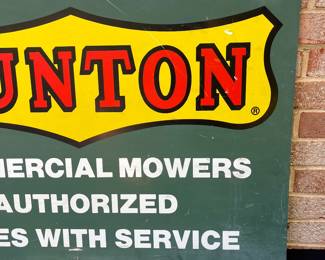 A63 - $100. Bunton Commercial Mowers Double-sided sign. Measures 36” x 24”.