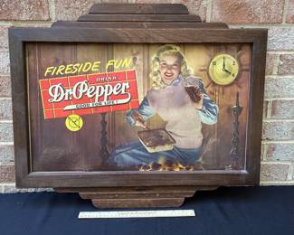 A67 - $550. Dr Pepper “Fireside Fun” cardboard sign with wood frame. Measures 26.5“ x 22“.
