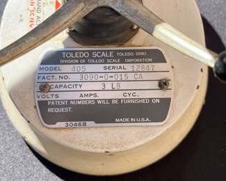 A122 - $100. Toledo scale. Model 405.
