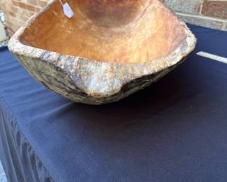 A113 - $95. Primitive Dough Bowl w/ old repair. Measures 33 1/2” x 13”.