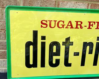A53 - $350. Vintage Sugar-Free Diet-Rite Cola metal sign. Bottom Right is marked "MCA-269"Measures 54” x 18”.