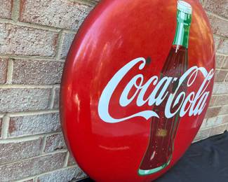 A25 - $550. 1950s Coca-Cola Enameled Bubble Sign. Measures 24” diameter.