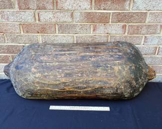 A113 - $95. Primitive Dough Bowl w/ old repair. Measures 33 1/2” x 13”.