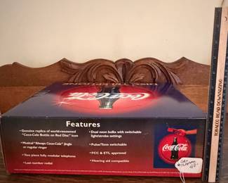 A218 - $40. Coca-Cola disc telephone. Still in box. Brand new.