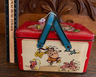 A228 - $20. Joe Palooka lunch kit. Measures 7“ x 5“ 4 inches tall. Has paint wear and scratches on the inside. Overall good, used shape.