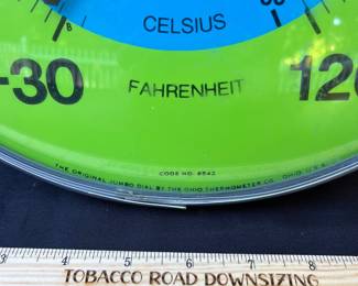 A31 - $100. 1970s 7-Up Thermometer. Measures 12.5 diameter.