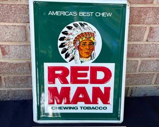 A9 - $65. Red man, chewing tobacco metal sign. Measures 12 x 16“. Has a few light scratches, otherwise in good vintage shape.