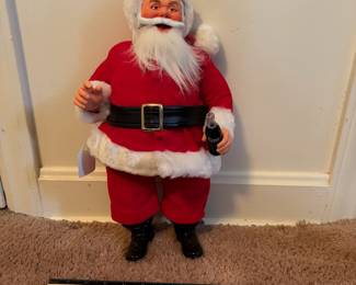 A210 - $40 PAIR. Two Coca-Cola Santas from 1992. Measures 15 inches tall. In good, vintage shape.