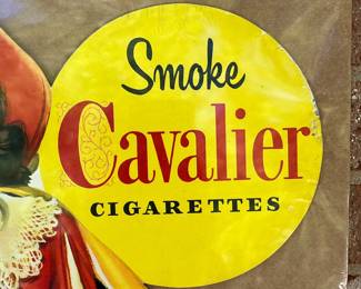 A6 - $80. Cavalier Cigarettes, die-cut counter display sign. Made in 1952. Measures 28 inches tall. Slight bending and creases on the hat and boot otherwise in great, vintage shape.