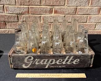 A119 - $165. 1939 Grapette wood crate with 25 6 ounce bottles. Camden Arkansas.