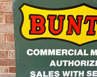 A63 - $100. Bunton Commercial Mowers Double-sided sign. Measures 36” x 24”.