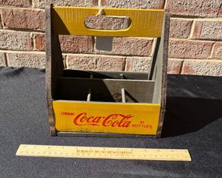 A84 - $60. Six bottle Coca-Cola carrying case. Measures 8.5”x 5.5”