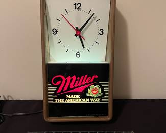 A141 - $30. Miller made the American way lighted wall clock. Works perfectly. Measures 8" x 14" tall.