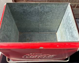 A42 - $100. Vintage Coca-Cola Cooler by Acton. Measures 17” x 12” x 19.5”. This has some wear and rubbed off paint and scratches. Handle works to lock it and has insert tray.