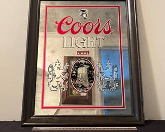 A159 - $15. Coors Light beer pub mirror. Has a sticker on top. Measures 19.5" x 15.75" tall.
