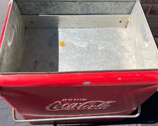 A42 - $100. Vintage Coca-Cola Cooler by Acton. Measures 17” x 12” x 19.5”. This has some wear and rubbed off paint and scratches. Handle works to lock it and has insert tray.