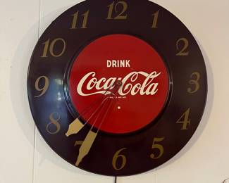 A199 - $85. 1950's Coca-Cola Clock. Not working. Measures 18" round. Original melamine Clock movement housing.
