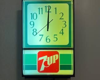 A139 - $100. 7-Up lighted wall clock. Excellent condition. Works perfect perfectly. Measures 12" x 18" tall.