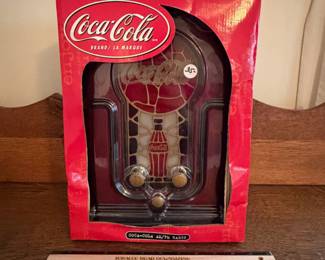 A216 - $35. Coca-Cola AM/FM radio. Still in box, in new great shape.