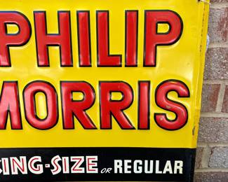 A13 - $550. Vintage Call for Philip Morris metal sign. Stout Sign Co. Measures 15” x 27”. The sign has some wear on the edges, and some scraped off paint. It has some rubbed off paint or rust right in the middle at the top of the sign.