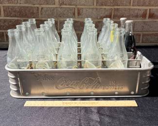 A43 - $165. 1940s Coca-Cola Aluminum Coke Bottle Stadium Carrier. Includes bottles (75th Anniversary bottles)