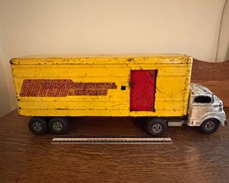 A213 - $60. Structo 1950’s Truck. Measures 22.5 inches long. It has many scratches throughout the body of the truck. Still moves well.