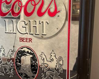 A159 - $15. Coors Light beer pub mirror. Has a sticker on top. Measures 19.5" x 15.75" tall.