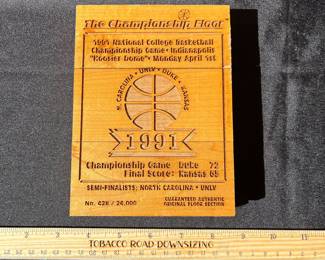 A123 - $85. 1991 NCAA Men's Championship Basketball game floor piece.