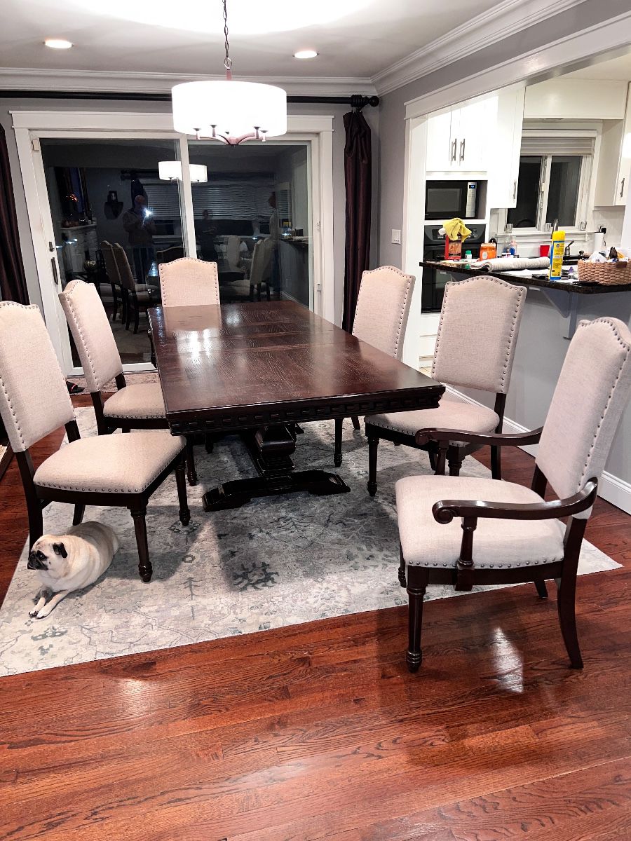 Dining table and six chairs with two extra leaves